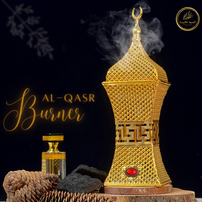 Al-Qasr 'القصر'Bakhoor Burner showing smoke of scented bakhoors placed on wooden surface with an elegant design in  golden colour.