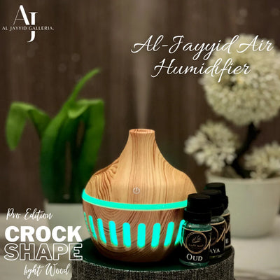 Crock Shape Air Humidifier in light wood colour with colourful sea green light by Al Jayyid Galleria.